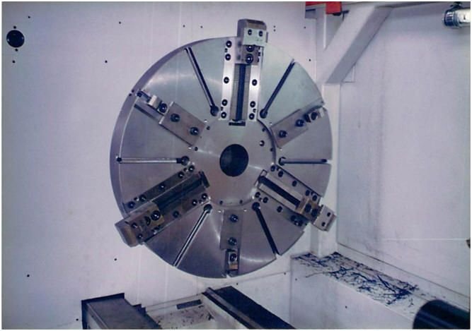 WIAP Reparatur Heid CNC-Drehbank: Bild 10.1 Diese Maschine musste für das Eisenbahn Räder Spannen ein besonderes 2 Druck Sys
