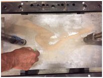 Bild 9c: Sandtest 1 auf einer Platte.